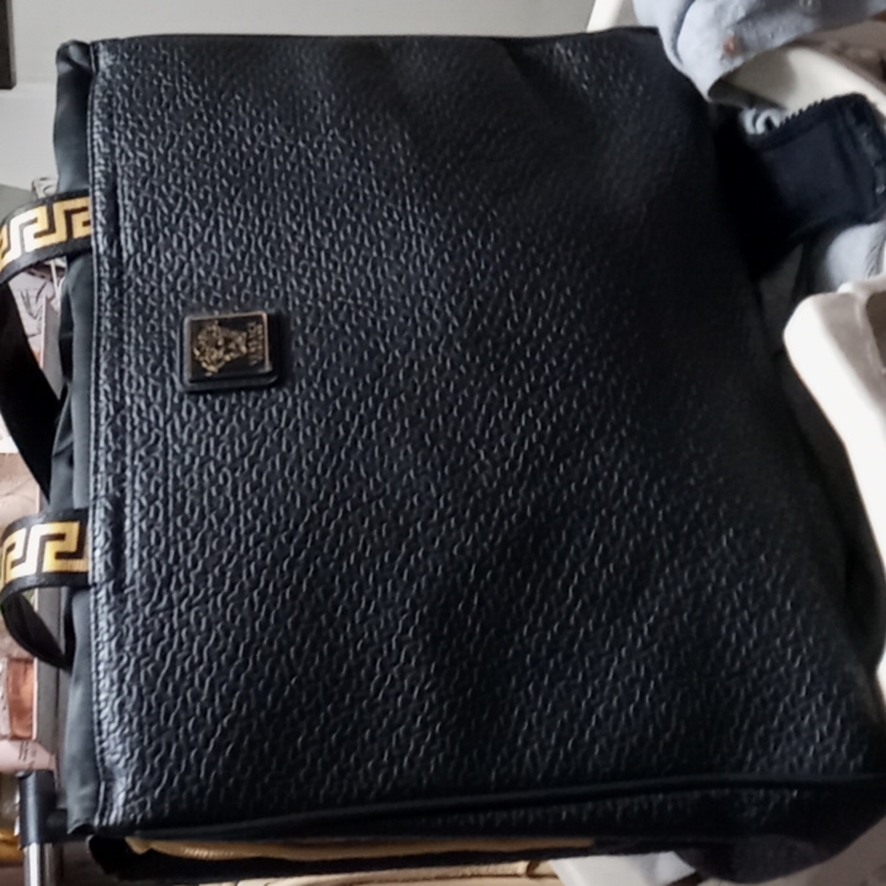 Versace drawstring carry all bag you can even travel with this bag carry cosmeti